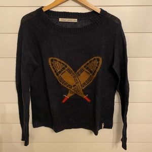 Woolrich sweater with old school snowshoes!